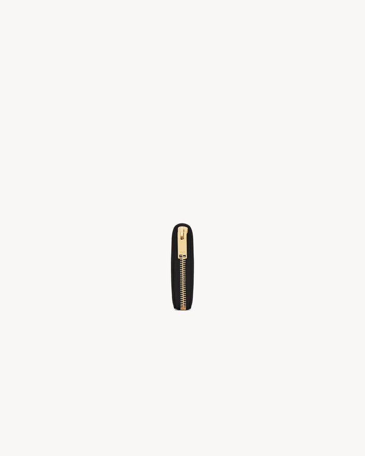 SAINT LAURENT CASSANDRE GRAND PORTEFEUILLE ZIPPÉ EN CUIR GRAIN DE POUDRE