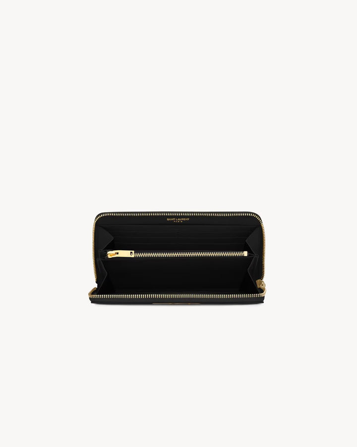 SAINT LAURENT CASSANDRE GRAND PORTEFEUILLE ZIPPÉ EN CUIR GRAIN DE POUDRE