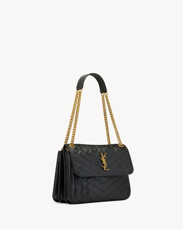 NIKI TRIPOUCH en cuir vintage