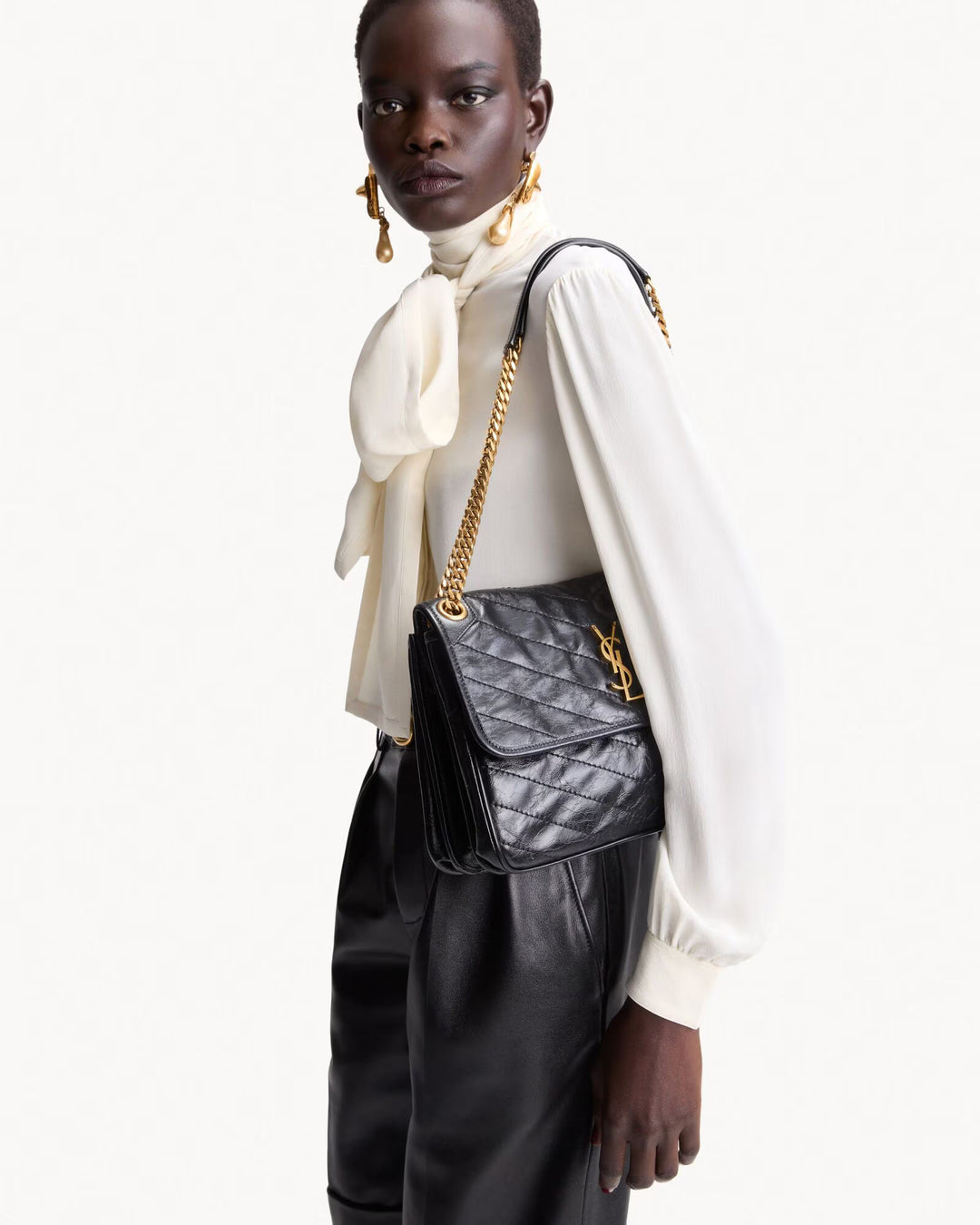 NIKI TRIPOUCH en cuir vintage