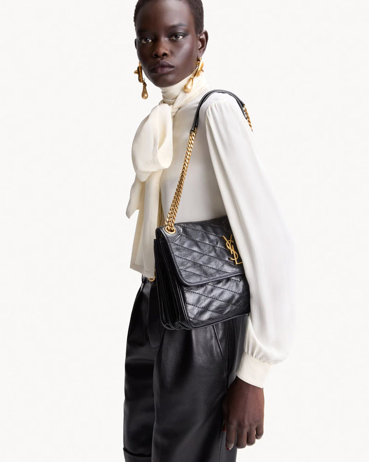 NIKI TRIPOUCH en cuir vintage