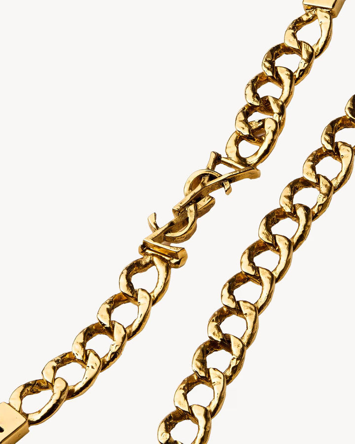 SAINT LAURENT Robe dos nu en maille avec chaîne CASSANDRE