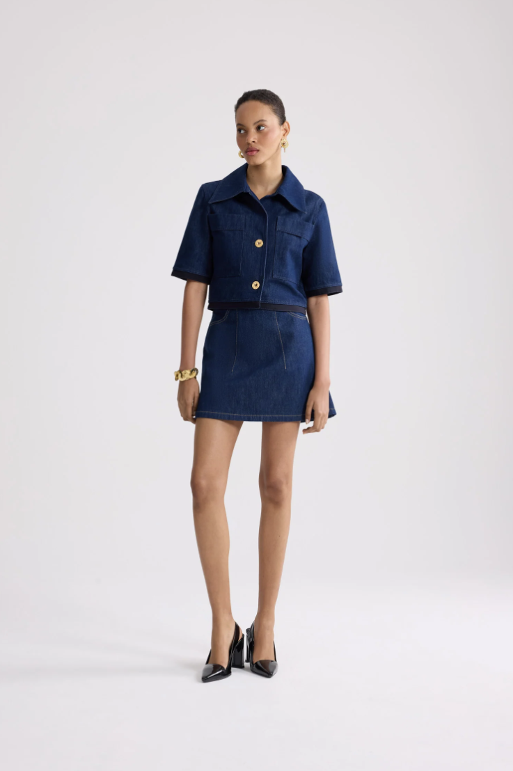 PATOU - Jupe courte à médaillon en denim de coton bio