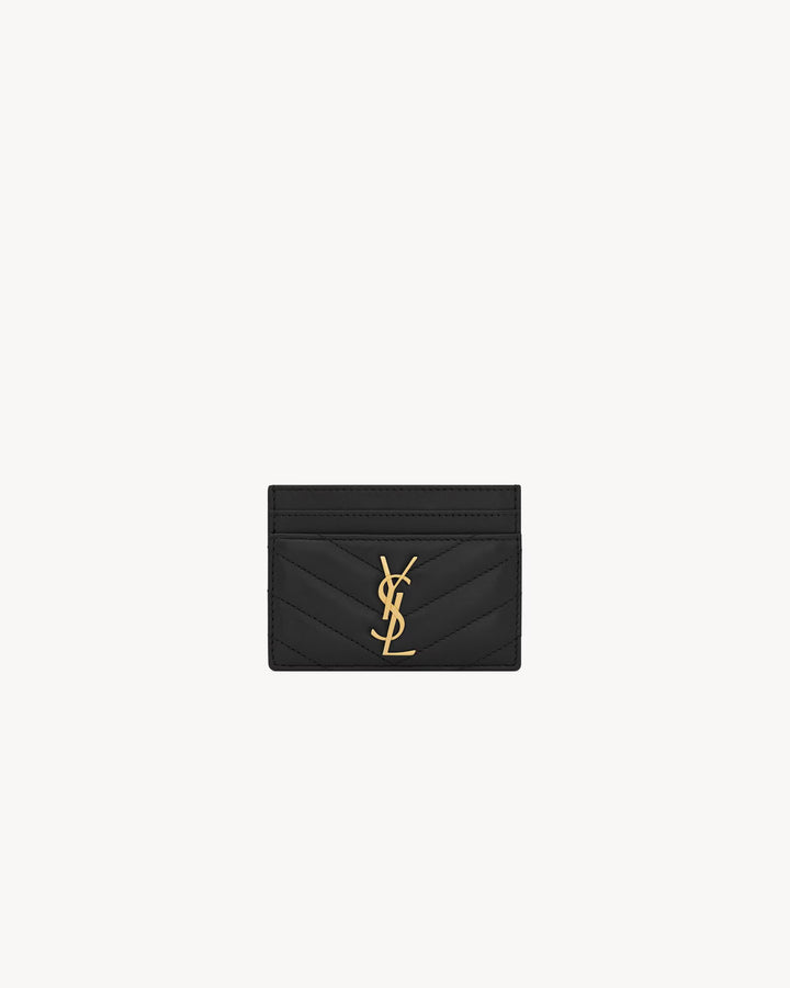 SAINT LAURENT - PORTE-CARTES ORNÉ DU CASSANDRE ET DE SURPIQÛRES MATELASSÉES.