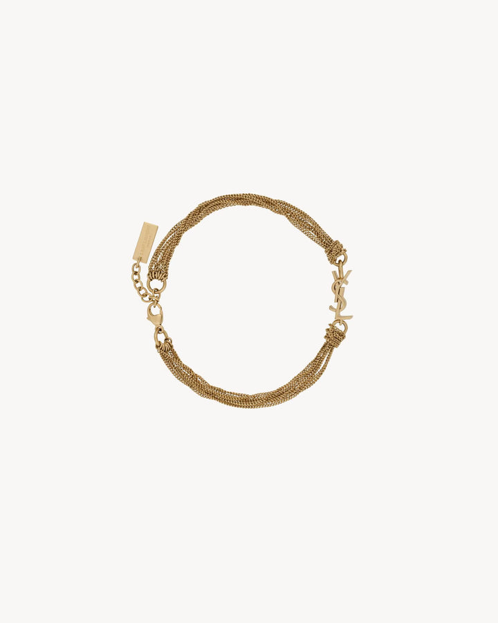 SAINT LAURENT - CASSANDRE bracelet à pompon en métal