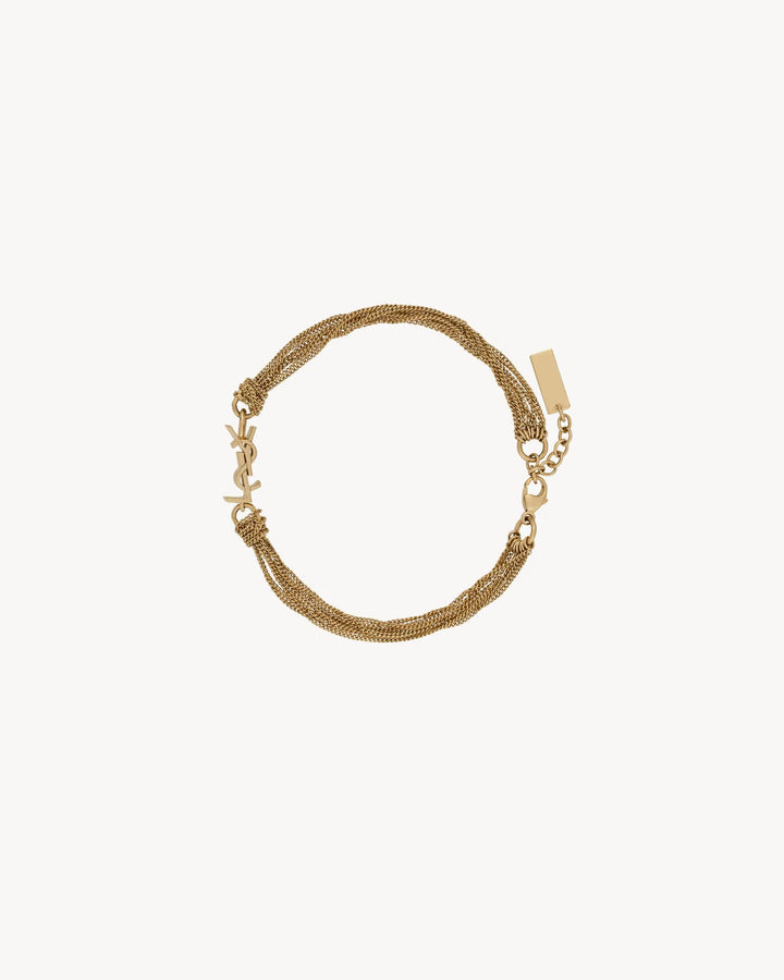 SAINT LAURENT - CASSANDRE bracelet à pompon en métal
