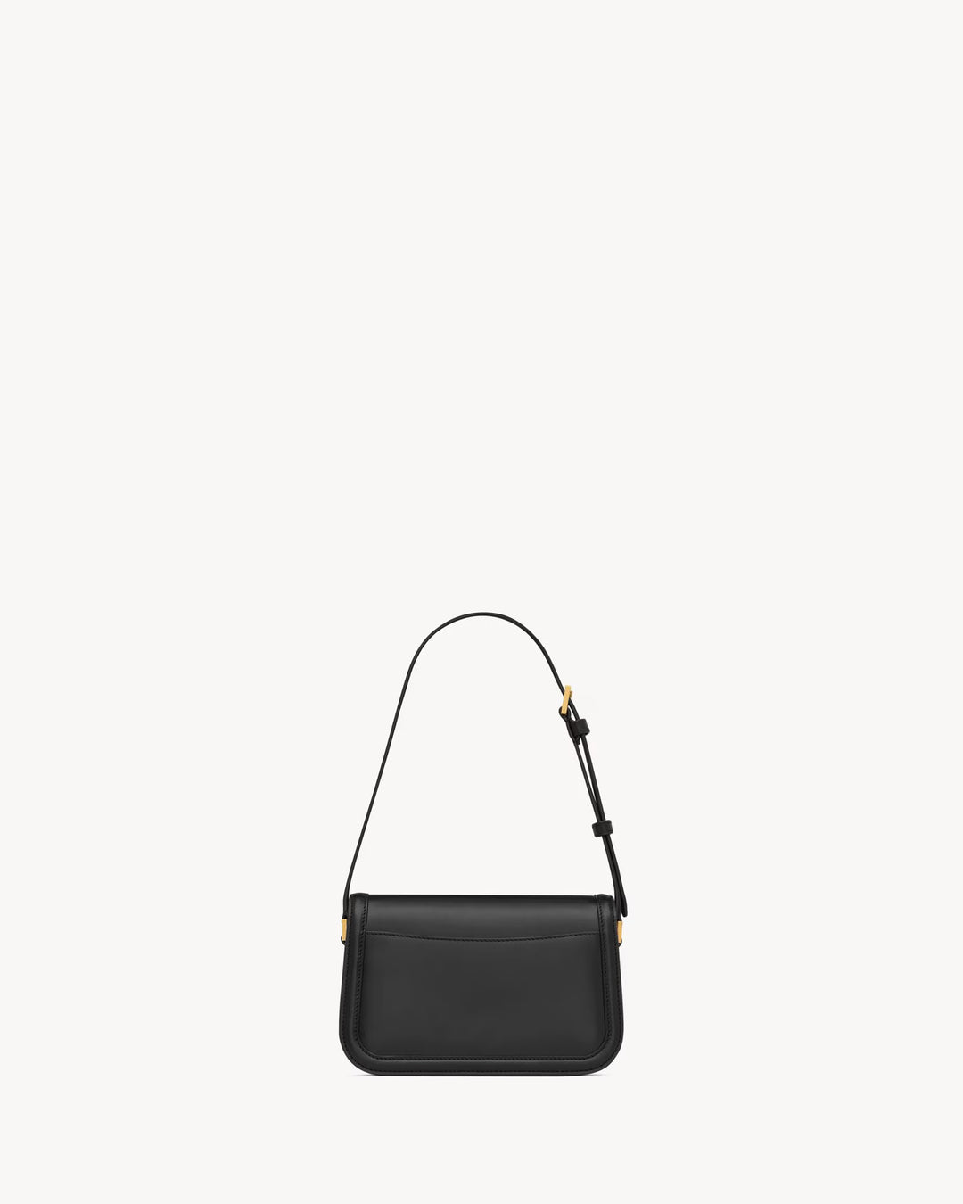 SAINT LAURENT - Sac en cuir box muni d'un fermoir cassandre.