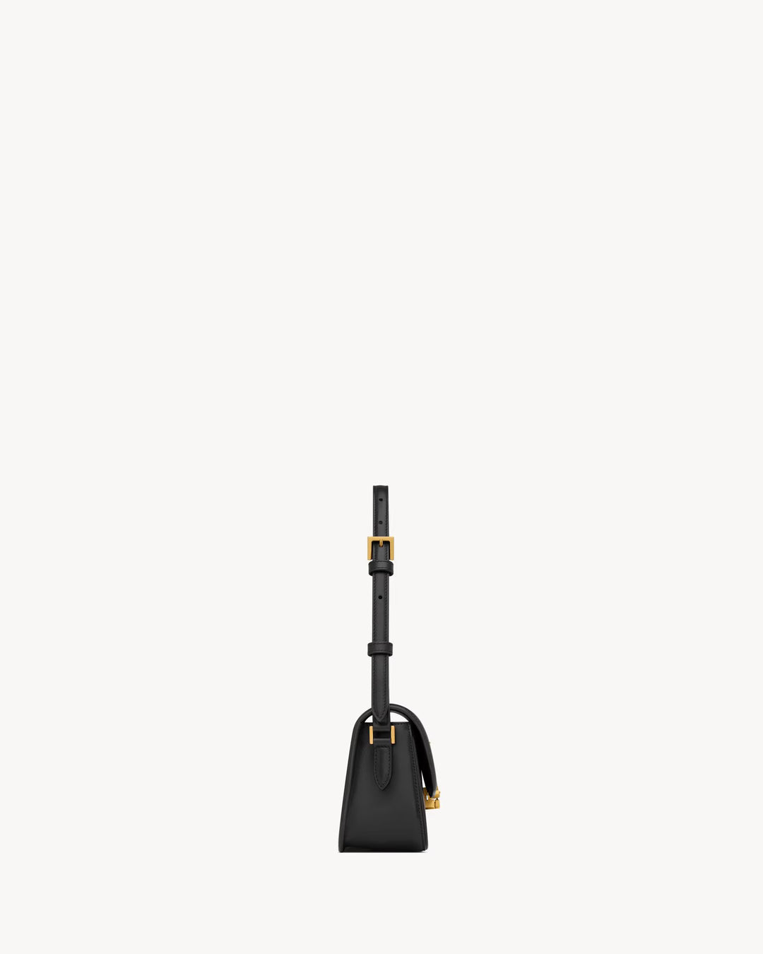 SAINT LAURENT - Sac en cuir box muni d'un fermoir cassandre.